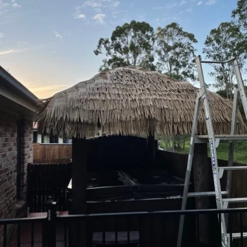 Thatched bali hut at dusk