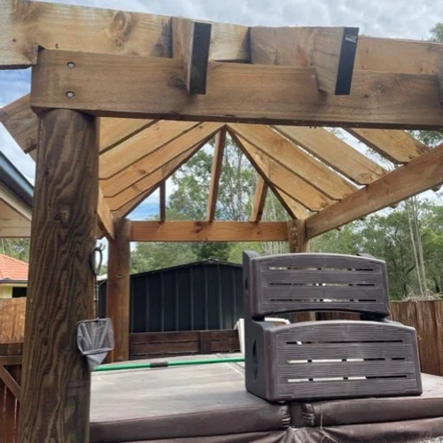 Timber pergola frame with steel brackets